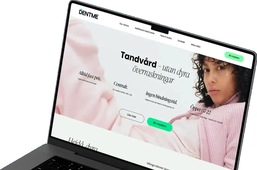 The previous DentMe home page on a laptop, with a pale pink hero and a small call to action.