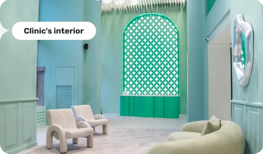 DentMe's clinic interior in soft green, with sculptural armchairs, a curved sofa and a patterned green arch, labelled 'Clinic's interior'.